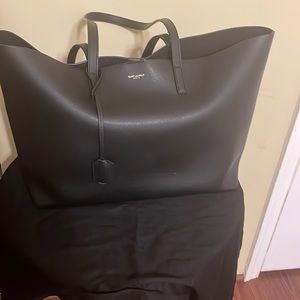 YSL tote with wristlet in perfect condition, so damage at all